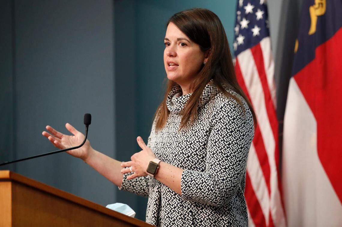 North Carolina Division of Public Health Pharmacist Dr. Amanda Fuller Moore speaks during a briefing at the Emergency Operations Center in Raleigh, N.C., Thursday, Dec. 10, 2020.