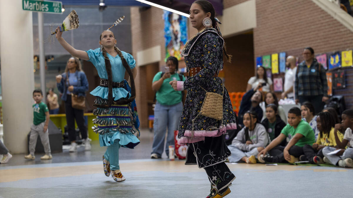 Skye Watson of the Haliwa-Saponi Indian Tribe, left, performs a Jingle Dress dance as Zena Clark, of the Tuscarora and Coharie tribes, performs an Eastern Woodland dance during a Native American Heritage Month celebration at Marbles Kids Museum in Raleigh on Tuesday, Nov. 25, 2025.