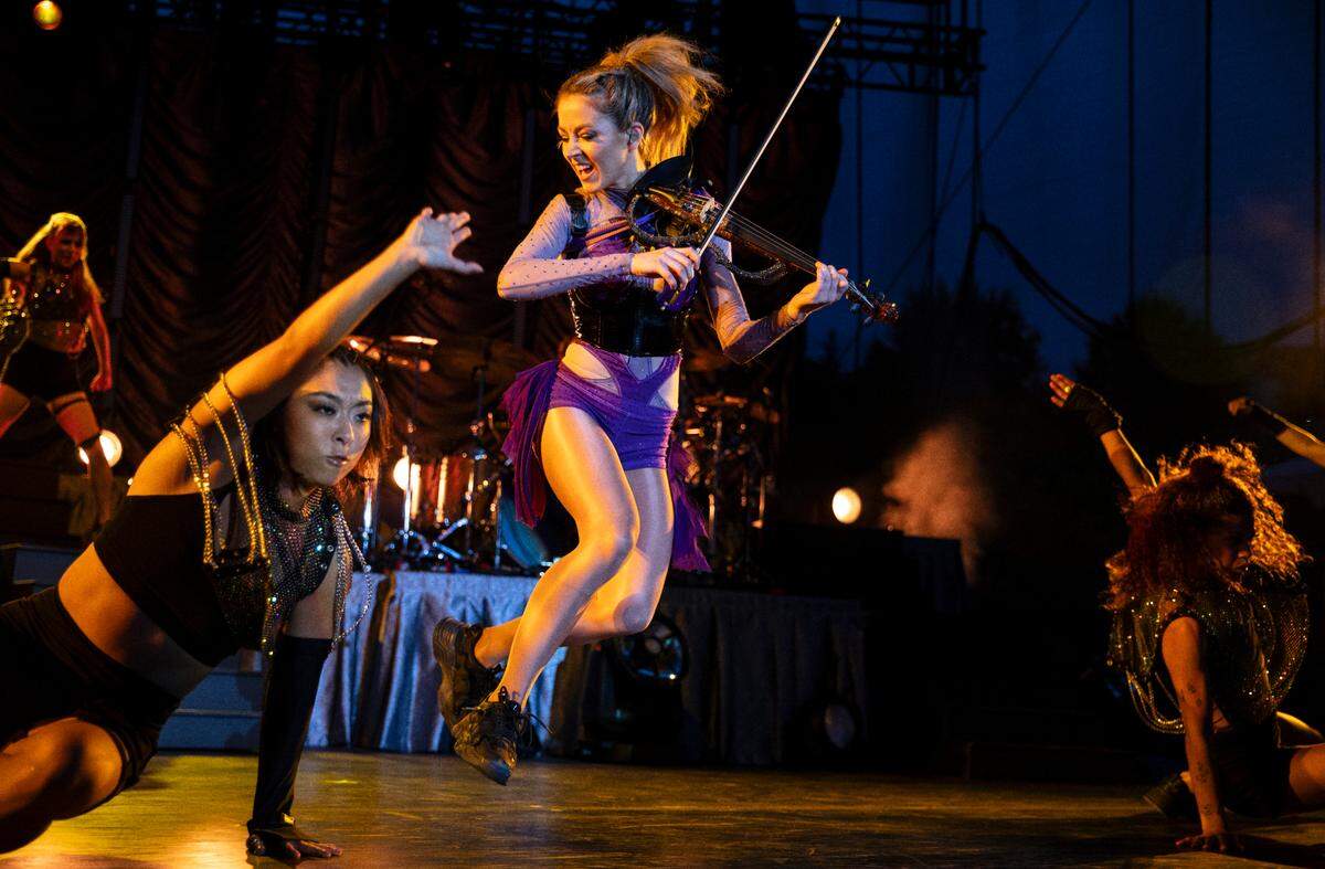 Lindsey Stirling brings her high energy tour to Raleigh, N.C.’s Red Hat Amphitheater for a concert with opener “Walk Off the Earth”, Tuesday night, Aug. 9, 2023.