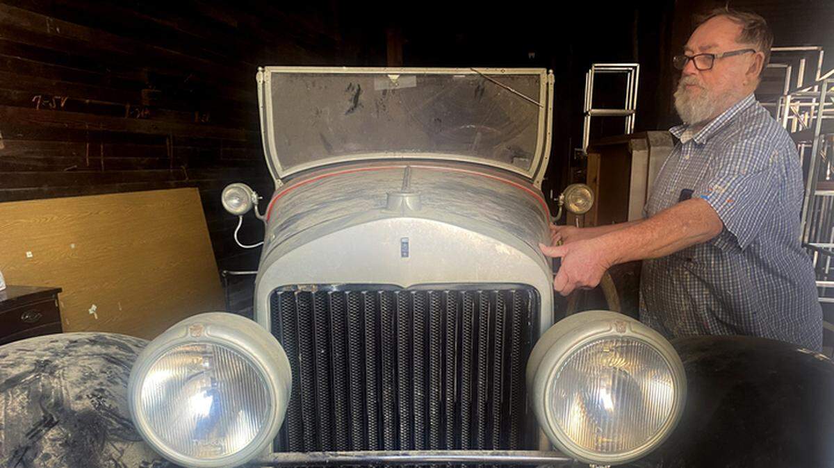 Sam Ezell shows the 1927 Cadillac, only one of seven in the world, that he hopes to restore. The car was part of James Freeland’s collection in Hillsborough.