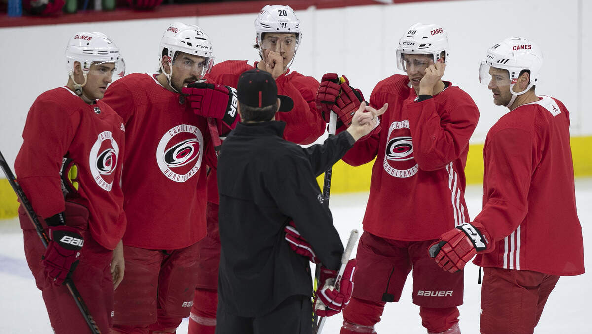Carolina Hurricanes’ coach Rod Brind’Amour talks with Nino Niederreiter (21), Justin Faulk (27), Sebastian Aho (20), Teuvo Teravainen (86) and Justin Williams (14) during practice on Wednesday, April 10, 2019 at the PNC Arena in Raleigh, N.C.