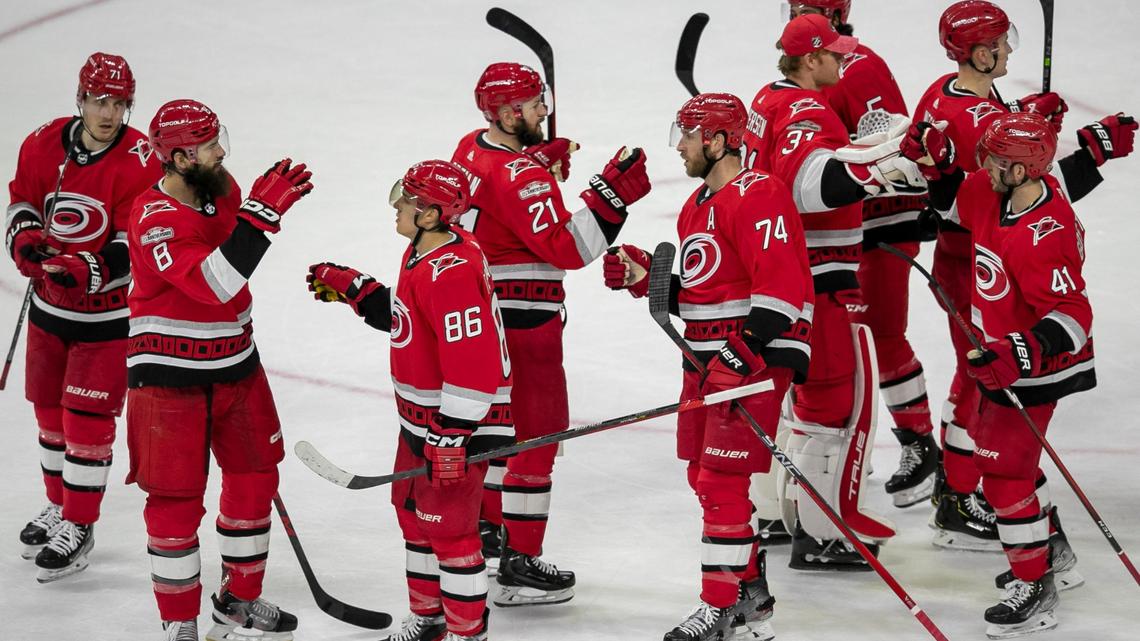 Carolina’s Hurricanes players Teuvo Teravainen (86) and Jaccob Slavin (74) celebrate the Hurricanes’ 2-1 victory over the New York Islanders with teammates on Tuesday, April 17, 2023 at PNC Arena in Raleigh, N.C.