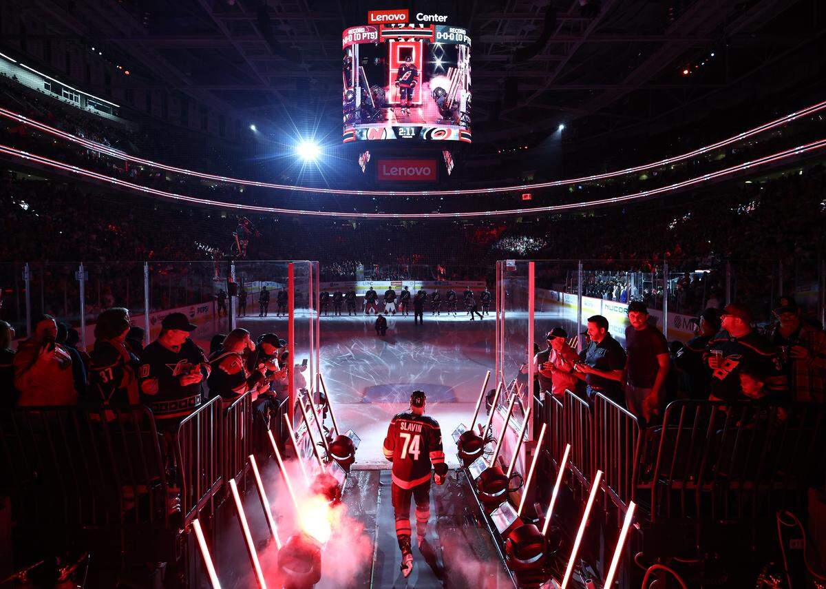 Jaccob Slavin of the Carolina Hurricanes is introduced prior to the game against the New Jersey Devils at Lenovo Center on Oct. 9, 2025 in Raleigh, North Carolina.