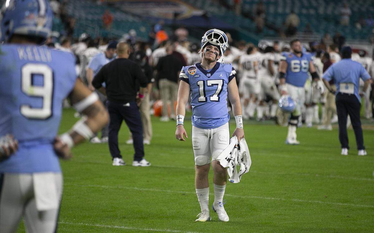 North Carolina kicker Grayson Atkins (17) leaves the field following the Tar Heels’ 41-27 loss to Texas A&M in the Capital One Orange Bowl on Saturday, January 2, 2021in Miami Gardens, Florida. 