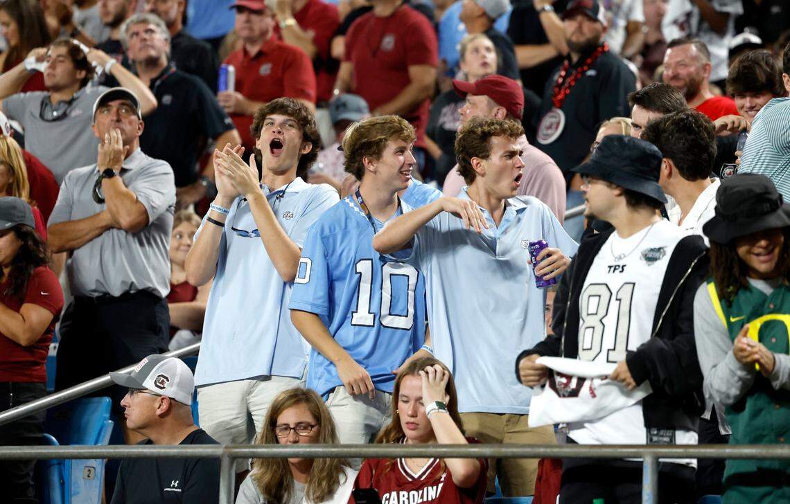 North Carolina fans celebrate a Tar Heel touchdown during the first half of UNC’s game against South Carolina in the Duke’s Mayo Classic at Bank of America Stadium in Charlotte, N.C., Saturday, Sept. 2, 2023.