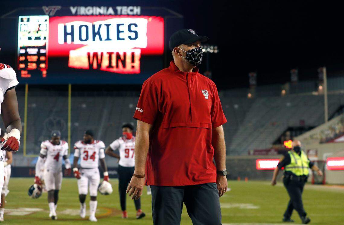 N.C. State head coach Dave Doeren walks off the field after Virginia Tech’s 45-24 victory over N.C. State at Lane Stadium in Blacksburg, VA Saturday, Sept. 26, 2020.