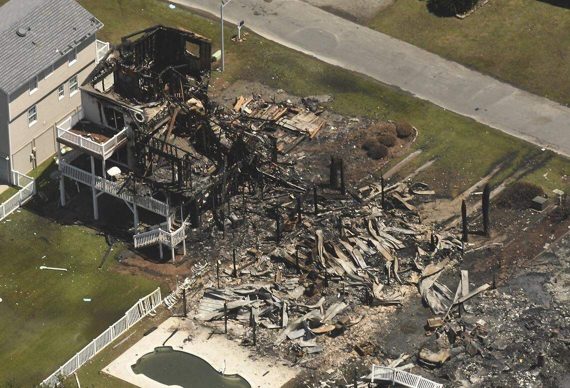 Several homes in Ocean Isle Beach, N.C. burned as Tropical Storm Isaias came ashore Tuesday Aug. 4, 2020 in Brunswick County. Isaias toggled between hurricane and tropical storm strength as it churned toward the East Coast. Fueled by warm ocean waters, the storm got a late burst of strength as a rejuvenated hurricane with top sustained winds of 85 mph (136 km/h) before coming ashore late Monday near Ocean Isle Beach.