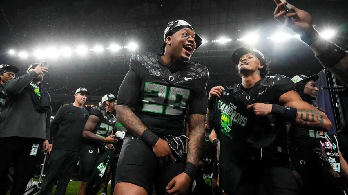 Oregon Ducks linebacker Bryce Boettcher (28) yells in excitement Sunday, Dec. 8, 2024, after the Big Ten Championship game at Lucas Oil Stadium in Indianapolis. The Oregon Ducks defeated the Penn State Nittany Lions, 45-37.