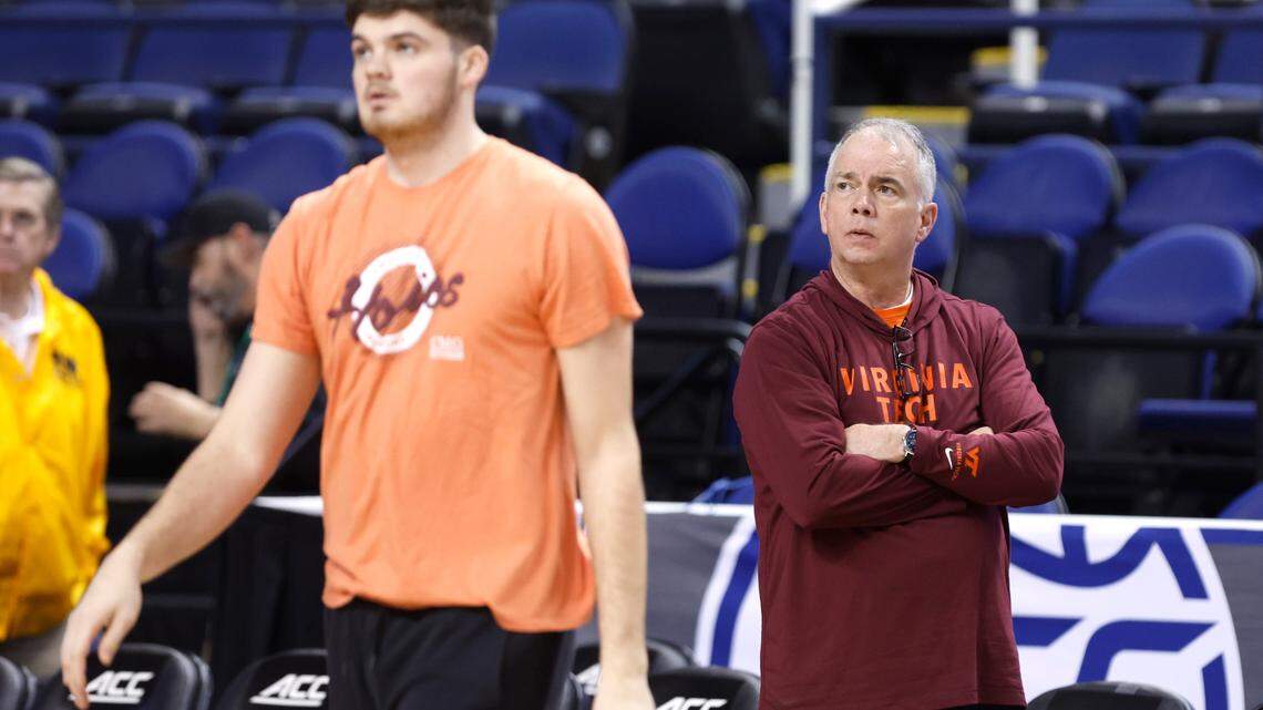 Virginia Tech head basketball coach Mike Young watches as his team, including Grant Basile, during open practice for the New York Life ACC Men’s Basketball Tournament at the Greensboro Coliseum in Greensboro, N.C., Monday, March 6, 2023.