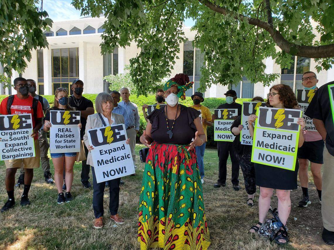 North Carolina state employee Patrice Jacobs, a member of UE Local 150 Public Service Workers Union, stressed the need for state employee raises that keep up with inflation during a news conference outside the Legislative Building in downtown Raleigh on Wednesday, June 22, 2022.