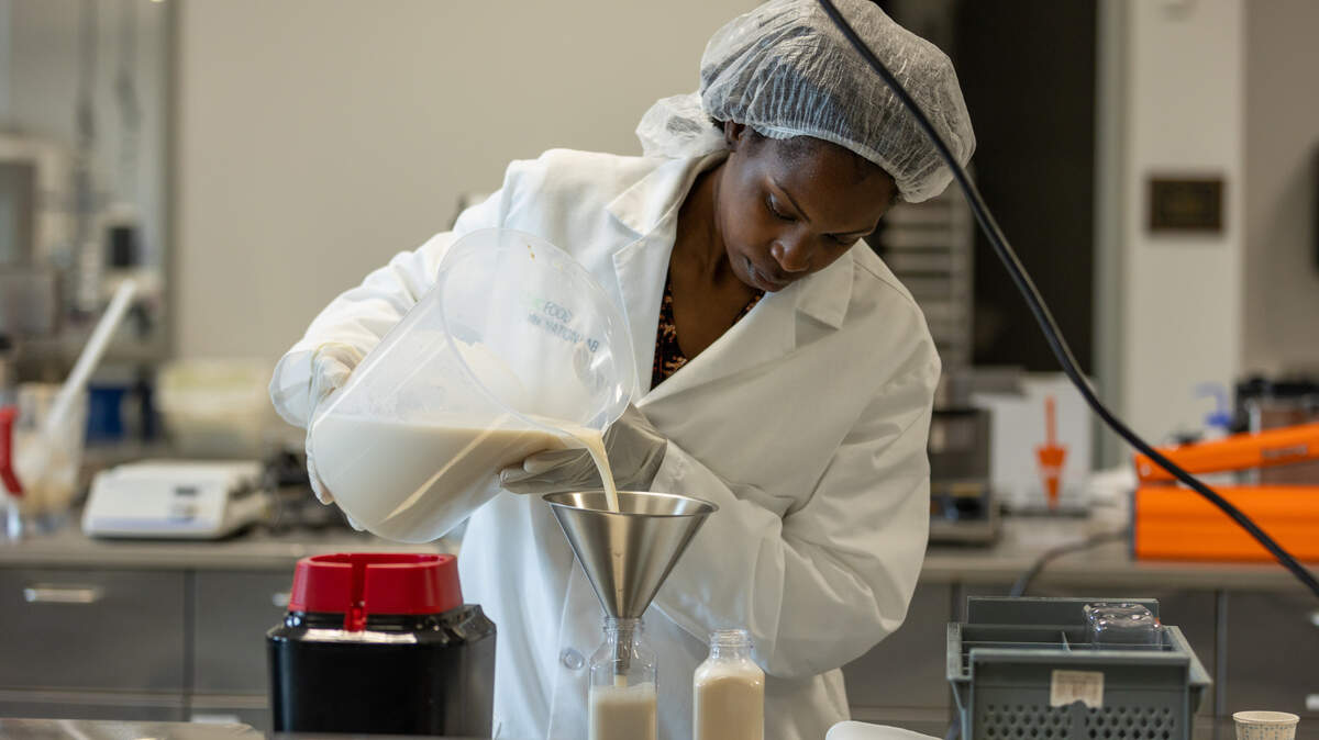 April Kelly works on her new plant-based milk for babies and toddlers at the North Carolina Food and Innovation lab in 2022. (Photo courtesy of April Kelly)