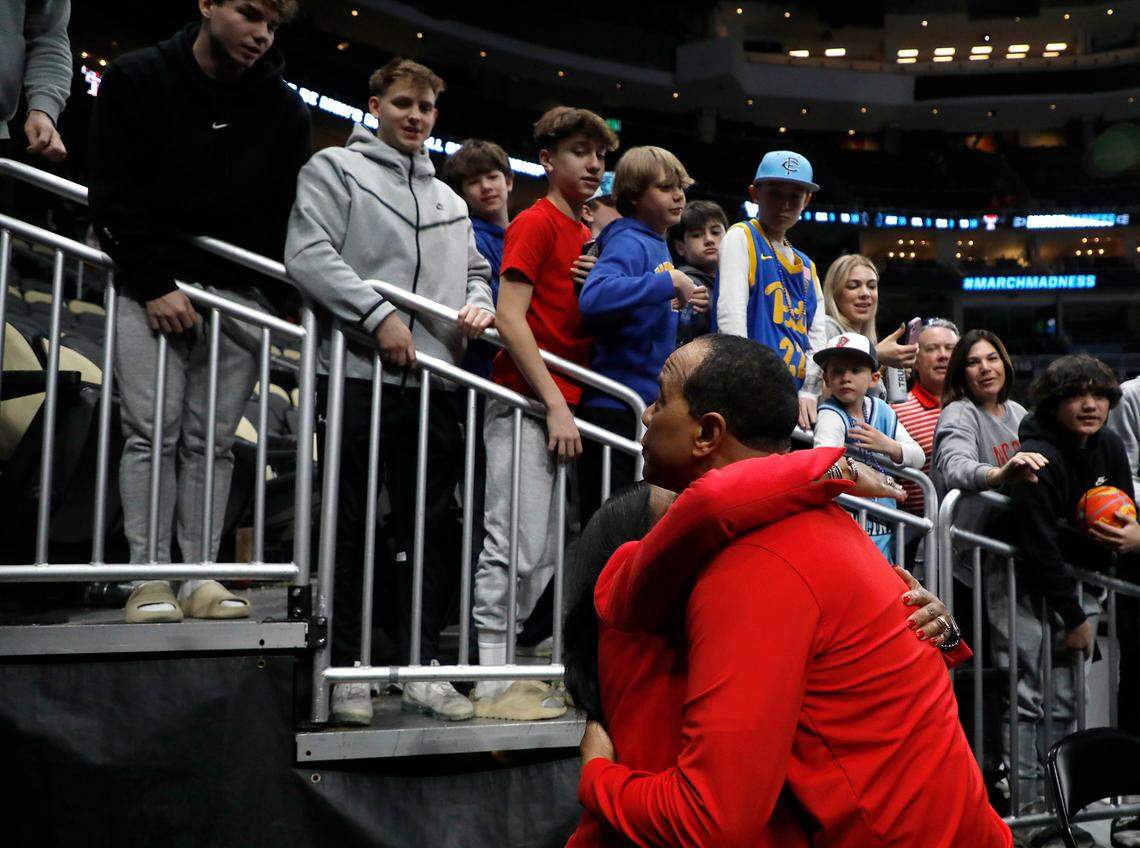 N.C. State head coach Kevin Keatts receives a hug following the Wolfpack’s 80-67 win over Texas Tech in the first round of the NCAA Tournament on Thursday, March 21, 2024, at PPG Paints Arena in Pittsburgh, Pa.
