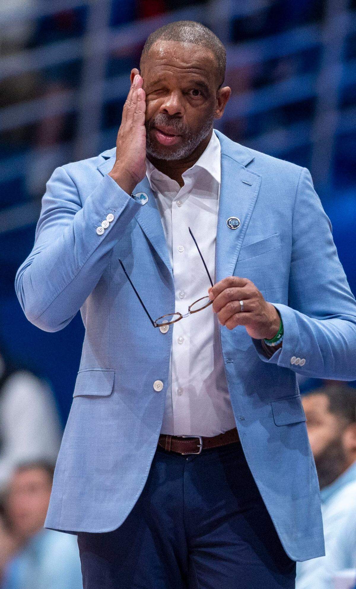 North Carolina coach Hubert Davis wipes sweat from his brow during the first half against Kansas on Friday, November 8, 2024 at Allen Fieldhouse in Lawrence, Kansas.