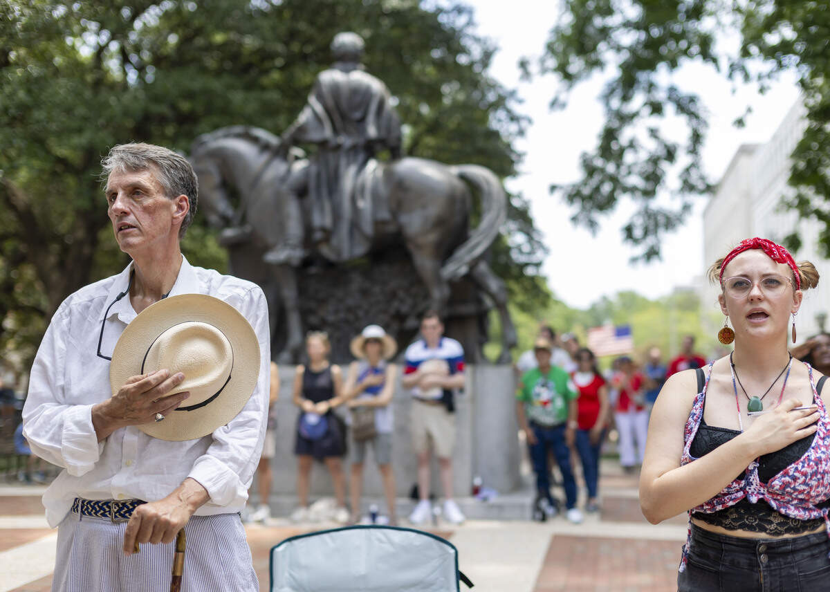 Kevin Cherry stands for the Pledge of Allegiance during the Freedom Fest 250, celebrating the country’s Semiquincentennial, on Saturday, July 4, 2026 in Raleigh, N.C.