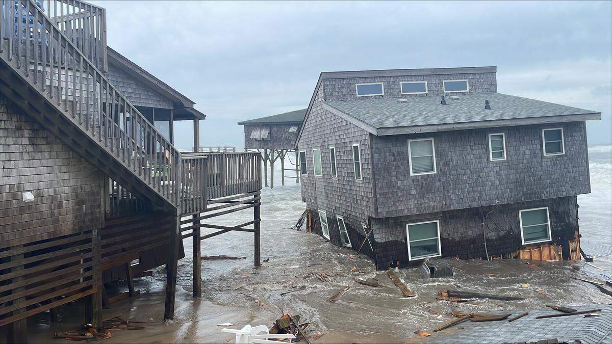 Wind and waves associated with Hurricane Humberto pulled multiple homes into the Atlantic along North Carolina’s Outer Banks, officials said.