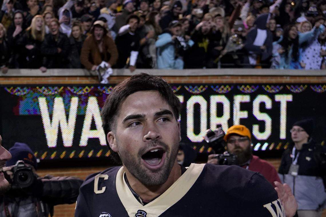 Wake Forest quarterback Sam Hartman celebrates after their win against North Carolina State in an NCAA college football game Saturday, Nov. 13, 2021, in Winston-Salem, N.C. (AP Photo/Chris Carlson)
