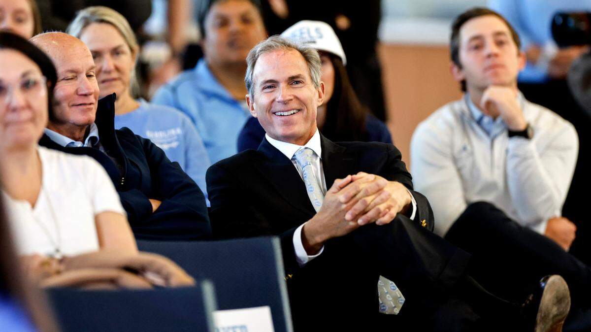 John Preyer, chair of the UNC Board of Trustees, listens during a press conference for new North Carolina head football coach Bill Belichick at the Loudermilk Center for Excellence at UNC in Chapel Hill, N.C., Thursday, Dec. 12, 2024.