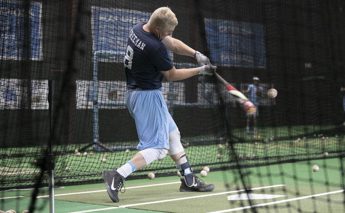 North Carolina’s Ike Freeman (8) takes a turn in the batting cage during the Tar Heels’ practice on Friday June 7, 2019 at Bosahmer Stadium in Chapel Hill, N.C. The Tar Heels were forced to move their practice for their NCAA Super Regional against Auburn indoors after heavy rain moved into the area on Friday afternoon.