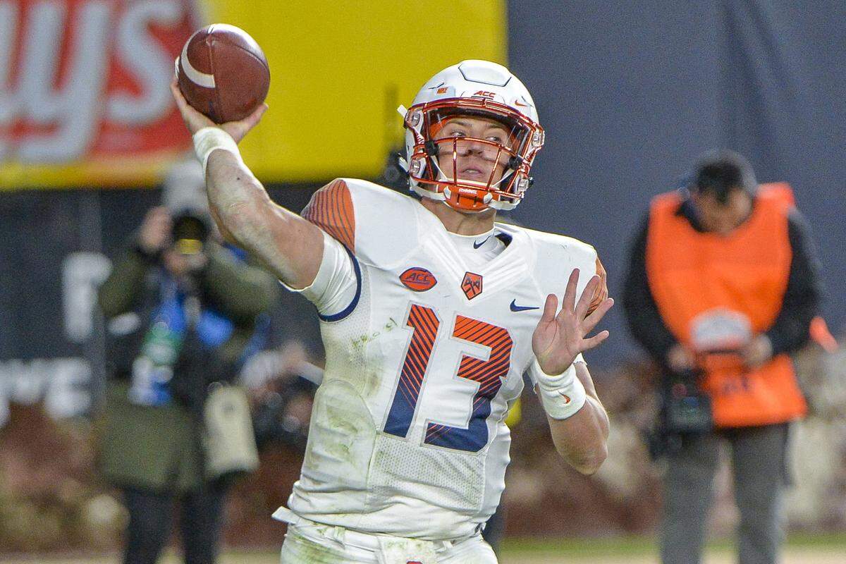 Syracuse quarterback Tommy DeVito (13) throws a pass during an NCAA college football game against Notre Dame, Saturday, Nov. 17, 2018, at Yankee Stadium in New York.