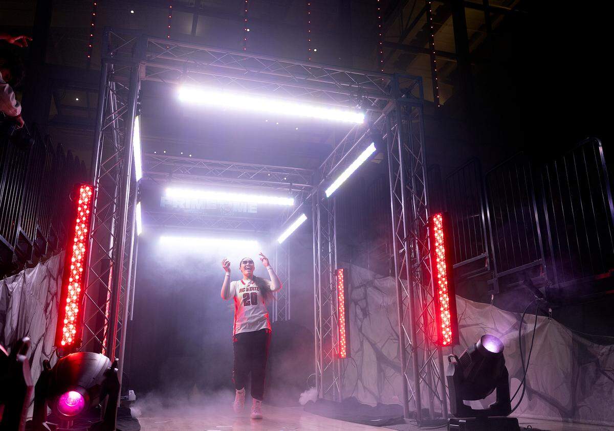 N.C. State’s Katie Peneueta is introduced during the “Primetime with the Pack” preseason event on Thursday, Oct. 26, 2023, at Reynolds Coliseum in Raleigh, N.C.