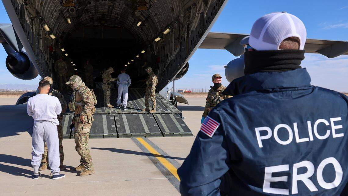 The Department of Homeland Security in February released images of detained migrants preparing to board the first flight to the migrants' detention center at the U.S. base in Guantanamo Bay.