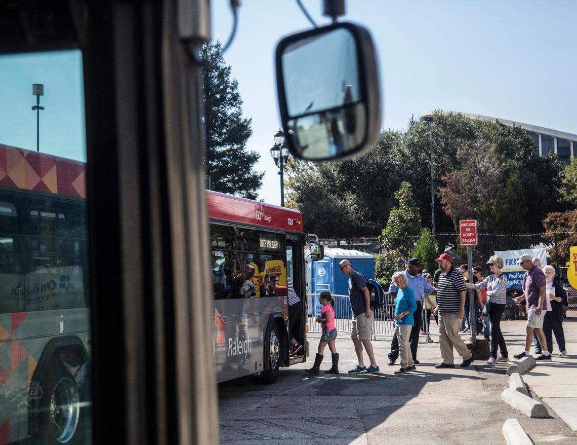 Fair-goers board a GoRaleigh N.C. State Fair Park and Ride Shuttle Monday October 17, 2016 at the North Carolina State Fair. GoRaleigh provides daily service to the State Fair operating from three locations. All passengers are dropped off at Gate 1 of the State Fairgrounds.
