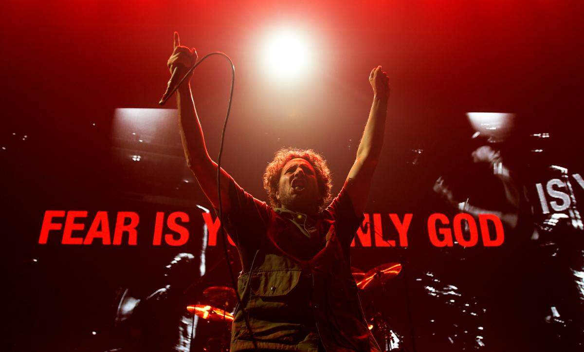 Rage Against the Machine’s Zack de la Rocha fires up the crowd during the Run the Jewels in concert, Sunday night, July 31, 2022 at Raleigh, N.C.’s PNC Arena.