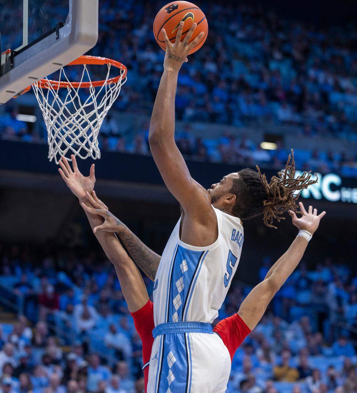 North Carolina’s Armando Bacot (5) goes to the basket for two of his game high 25 points against Radford in the second half on Monday, November 6, 2023 at the Dean Smith Center in Chapel Hill, N.C.