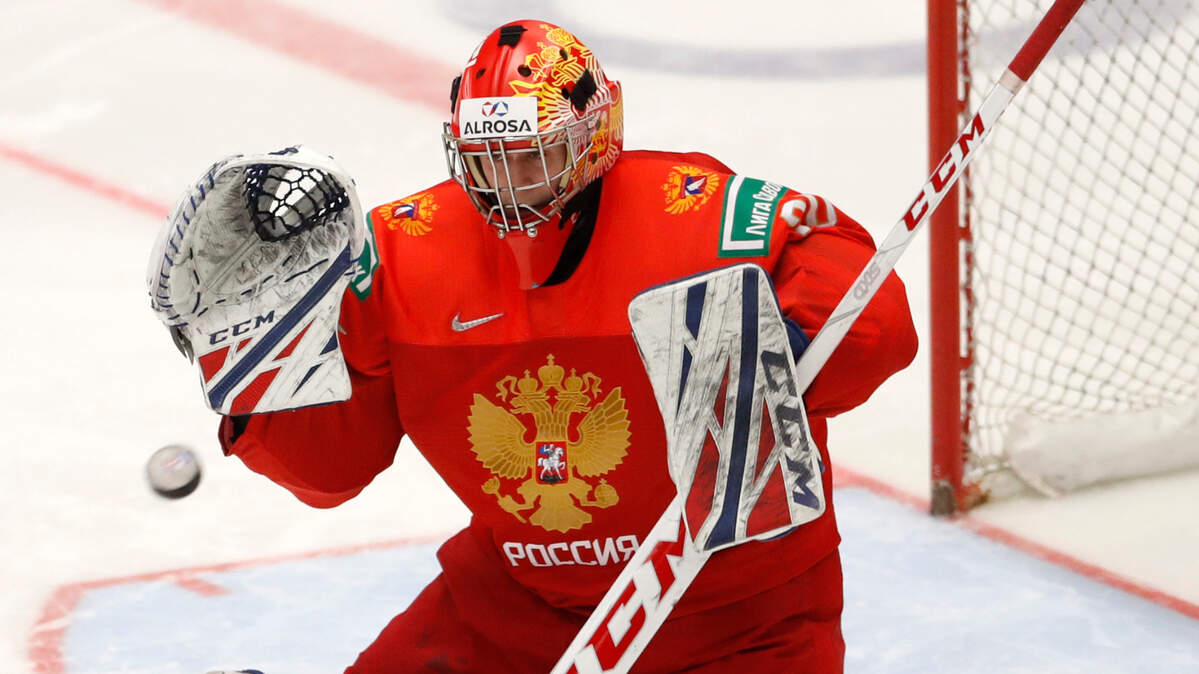 Russia’s goaltender Yaroslav Askarov makes a save during the U20 Ice Hockey Worlds semifinal match between Sweden and Russia in Ostrava, Czech Republic, Saturday, Jan. 4, 2020. (AP Photo/Petr David Josek)