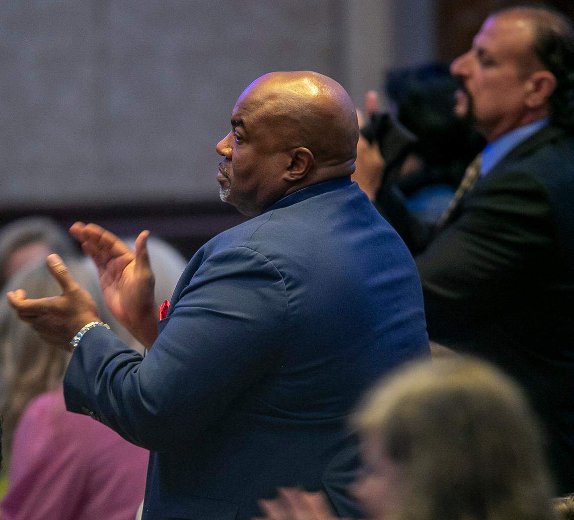 North Carolina Lt. Governor Mark Robinson, a candidate for governor in 2024, stands to applaud former President Donald Trump, during his speech at the North Carolina Republican Party Convention on Saturday, June 10, 2023 in Greensboro, N.C.