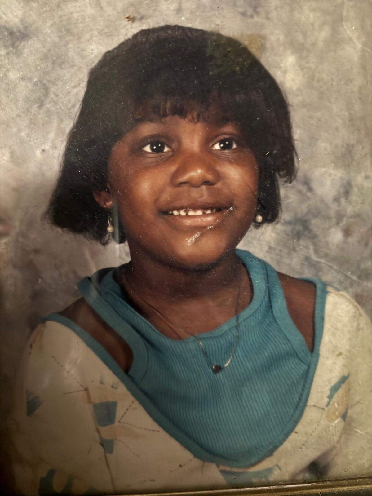 Kenashi McGraw during her childhood in Syracuse, New York. McGraw, 44, was found dead in Durham in September 2025.