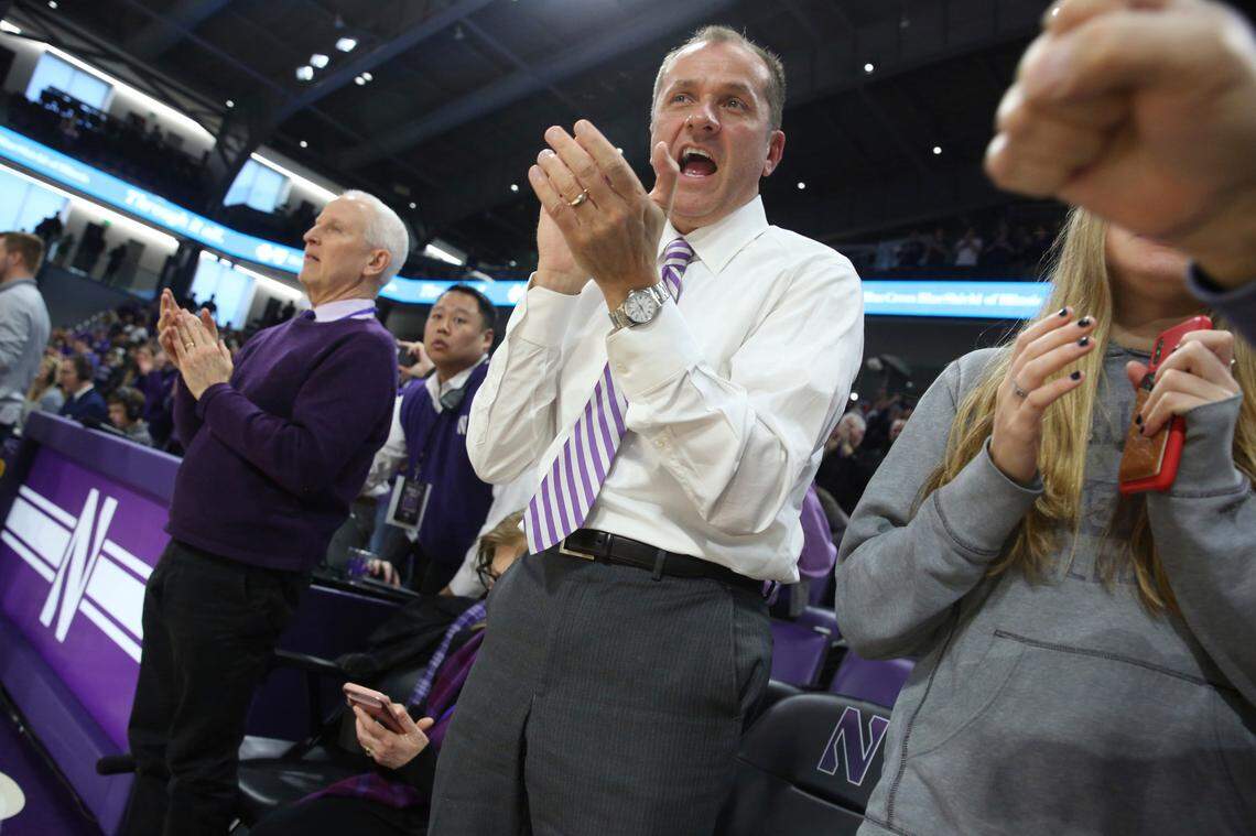 Northwestern University Athletic Director Jim Phillips celebrates as the Northwestern women’s basketball team beats Illinois 75-58 to win at least a share of the Big Ten Conference Championship at Welsh-Ryan Arena Saturday, Feb. 29, 2020, in Evanston, Ill.