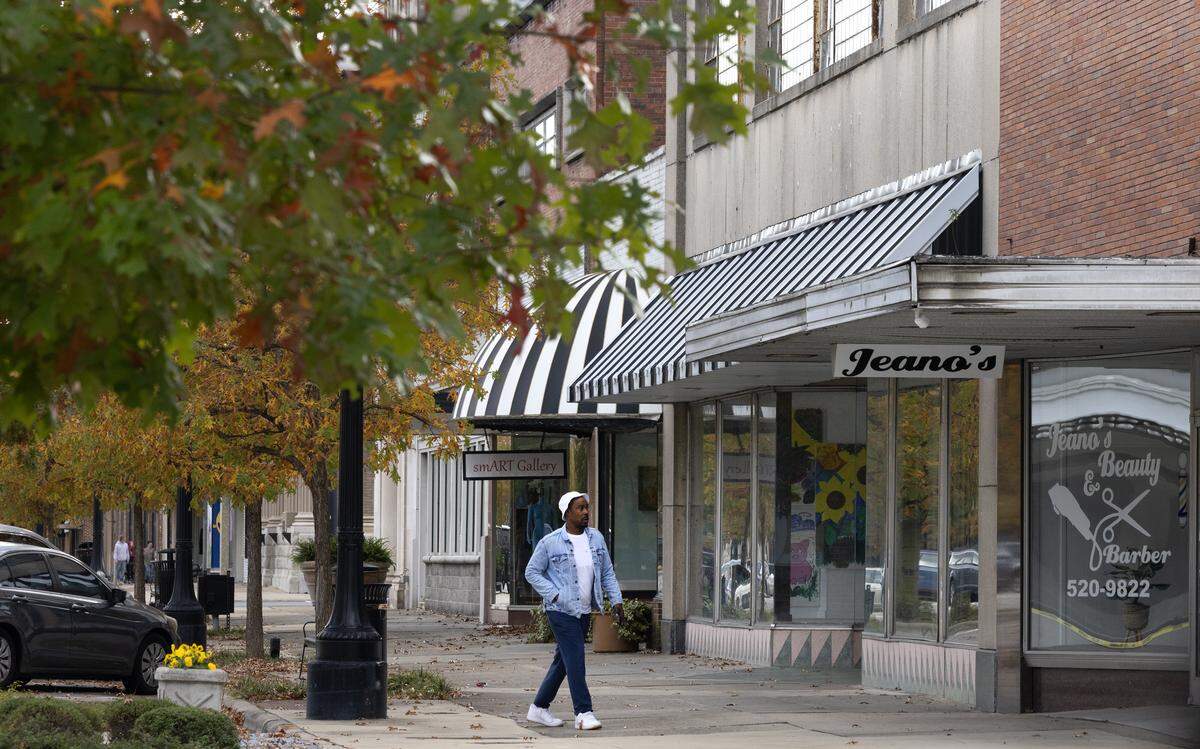 A man walks down Queen Street in the once thriving downtown of Kinston, home to one of the state’s largest Black communities, and one of the areas targeted by North Carolina lawmakers in a Trump-backed redistricting effort aimed at picking up another seat for Republicans in Congress. 