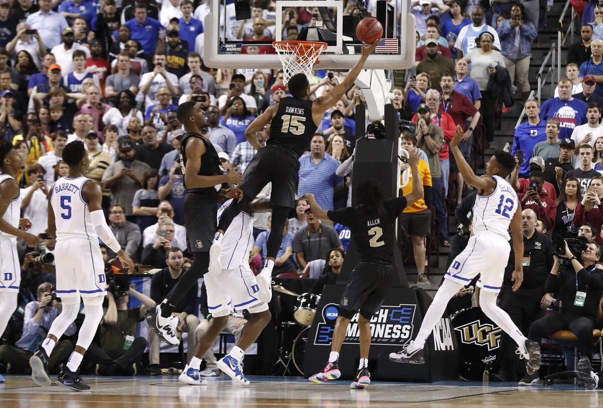 The last second shot by UCF’s Aubrey Dawkins (15) does not fall during Duke’s 77-76 victory over UCF in the second round of the NCAA Men’s Basketball Championship in Columbia, S.C., Sunday, March 24, 2019.