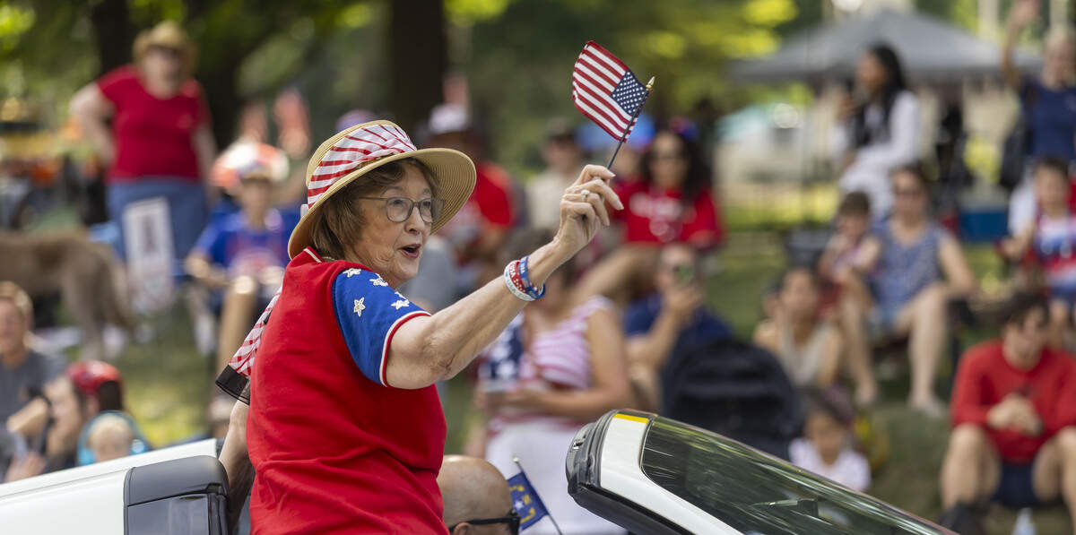 North Carolina Sec. of State Elaine Marshall, waves her flag during the First in Freedom Parade on Saturday, July 4, 2026 in Raleigh, N.C.