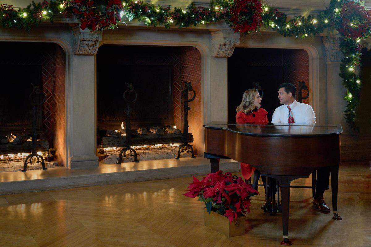 Bethany Joy Lenz and Kristoffer Polaha in “A Biltmore Christmas” on the Hallmark Channel. The movie was filmed at the Biltmore Estate in Asheville, NC, in January 2023.