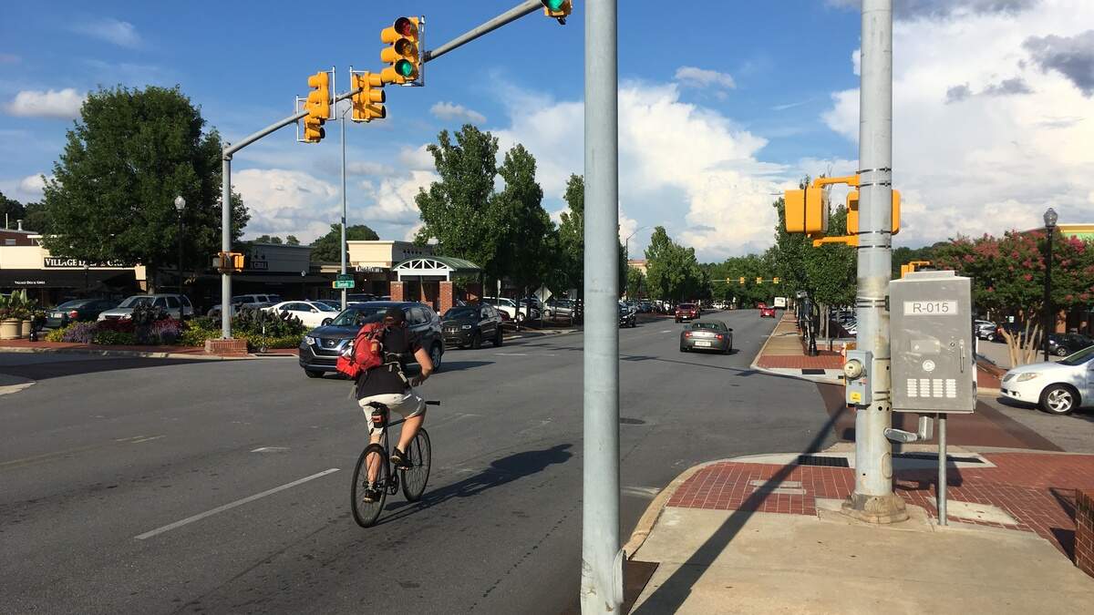 A cyclist on Cameron Street in Cameron Village in Raleigh.