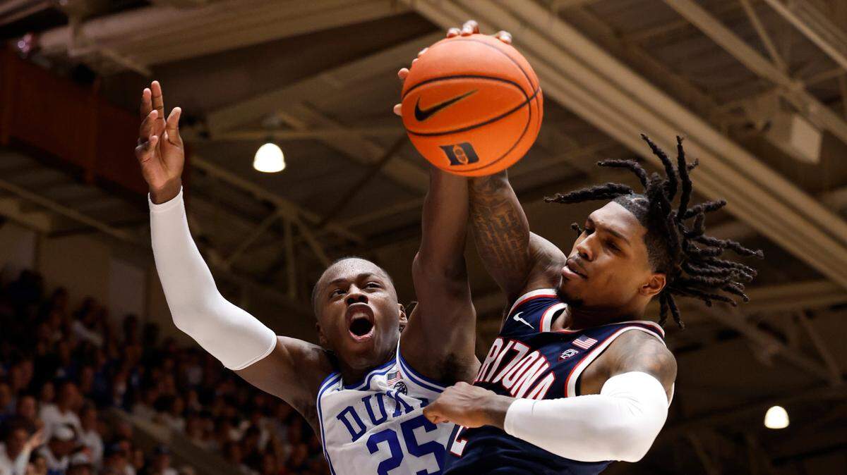 Arizona’s Caleb Love (2) blocks the shot by Duke’s Mark Mitchell (25) during the first half of Duke’s game against Arizona at Cameron Indoor Stadium in Durham, N.C., Friday, Nov. 10, 2023.