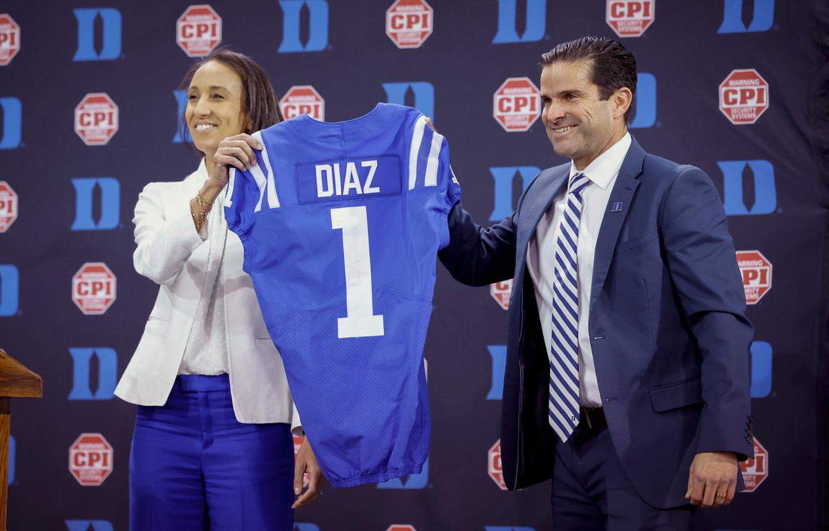 Duke athletics director Nina King introduces Manny Diaz as Duke's new head football coach during a press conference at Pascal Field House in Durham, N.C., Saturday, Dec. 9, 2023.