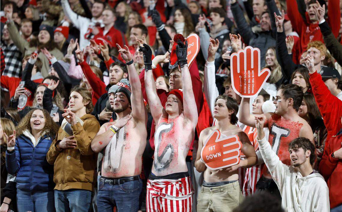 Fans sing the alma mater before N.C. State’s game against UNC at Carter-Finley Stadium in Raleigh, N.C., Saturday, Nov. 25, 2023.
