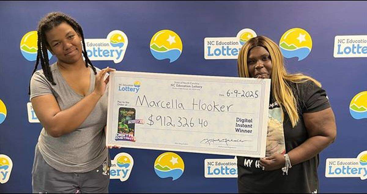 Marcella Hooker of Warsaw went to lottery headquarters in Raleigh on Monday, June 9, to pick up her prize. It came to $654,596 after state and federal withholdings, officials said.