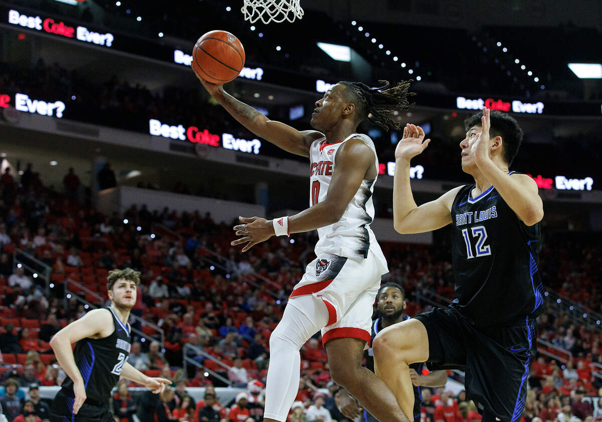 N.C. State’s DJ Horne drives to the basket during the second half of the Wolfpack’s 82-70 win over Saint Louis on Wednesday, Dec. 20, 2023, at PNC Arena in Raleigh, N.C.