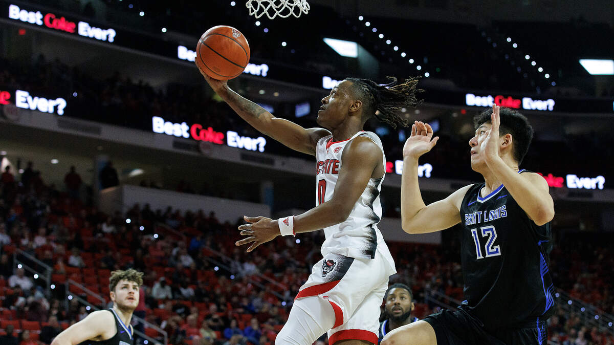 N.C. State’s DJ Horne drives to the basket during the second half of the Wolfpack’s 82-70 win over Saint Louis on Wednesday, Dec. 20, 2023, at PNC Arena in Raleigh, N.C.