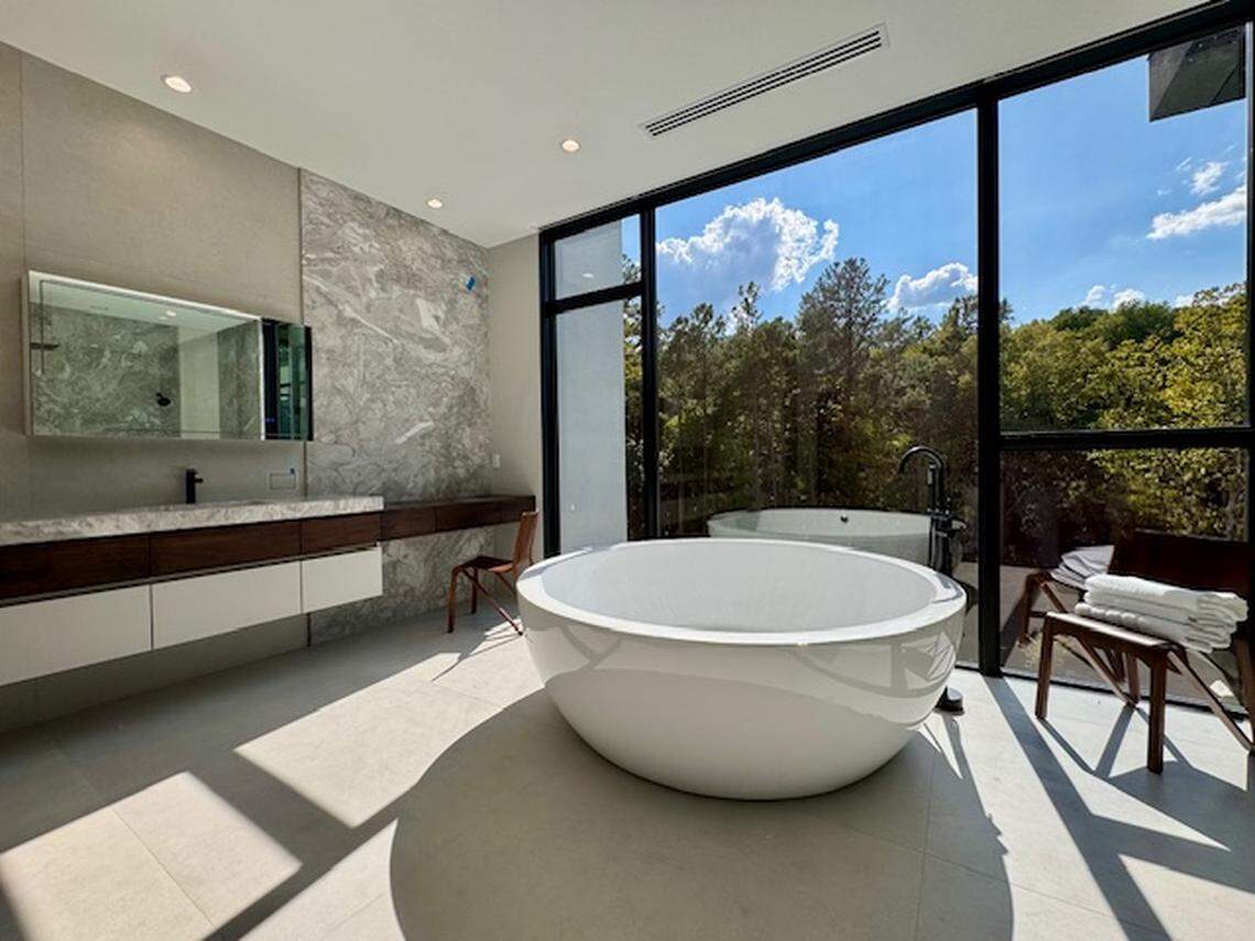 A bathroom with a view at 1756 Holton Forest Trail in North Raleigh.