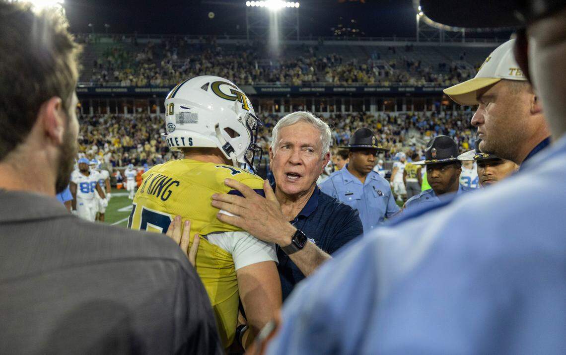 North Carolina coach Mack Brown congratulates Georgia Tech quarterback Haynes King (10) following the Yellow Jackets’ 46-42 victory on Saturday, October 28, 2023 at Bobby Dodd Stadium in Atlanta, Georgia.