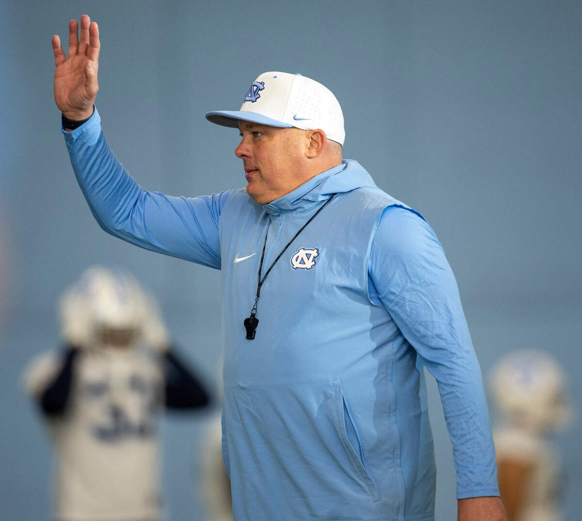 North Carolina defensive coordinator Geoff Collins instructs players during the opening day of spring football practice on Tuesday, March 19, 2024 in Chapel Hill, N.C.
