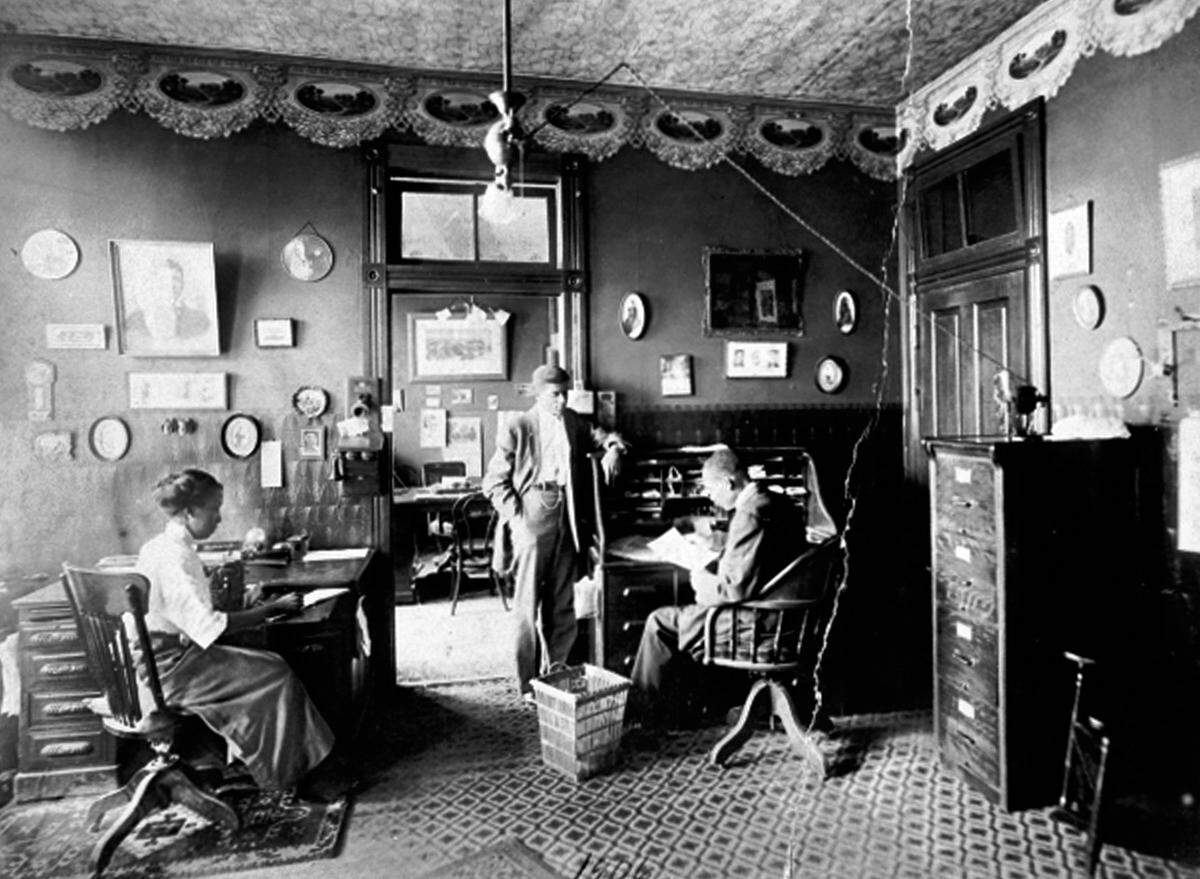 This 1906 photo shows Susan Gille Norfleet, C.C. Spaulding Sr. and John Merrick, employees of the North Carolina Mutual Life Insurance Company in Durham, N.C.