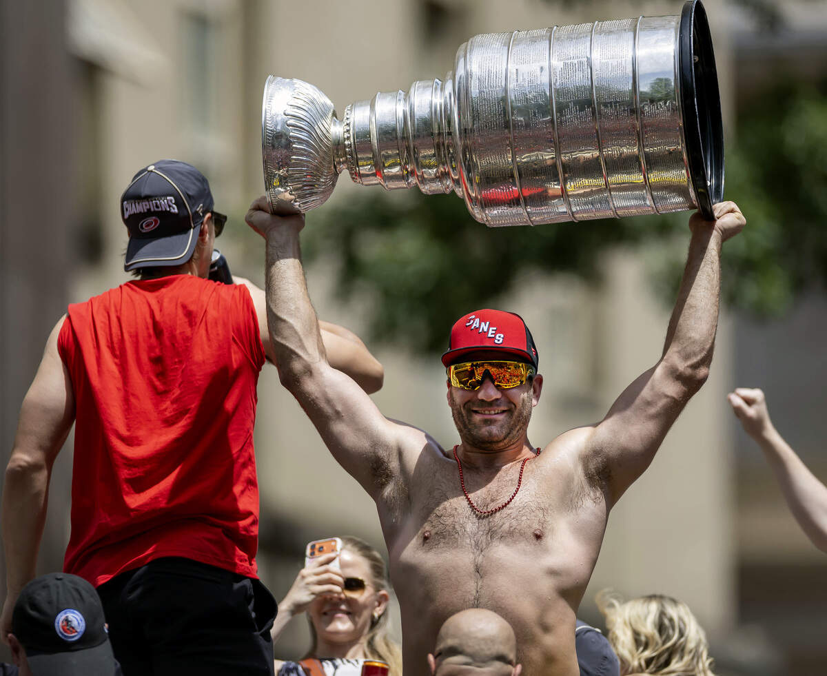 Carolina Hurricanes left wing Jordan Martinook displays the Stanley Cup during the parade, on Saturday, June 20, 2026 in Raleigh, NC.