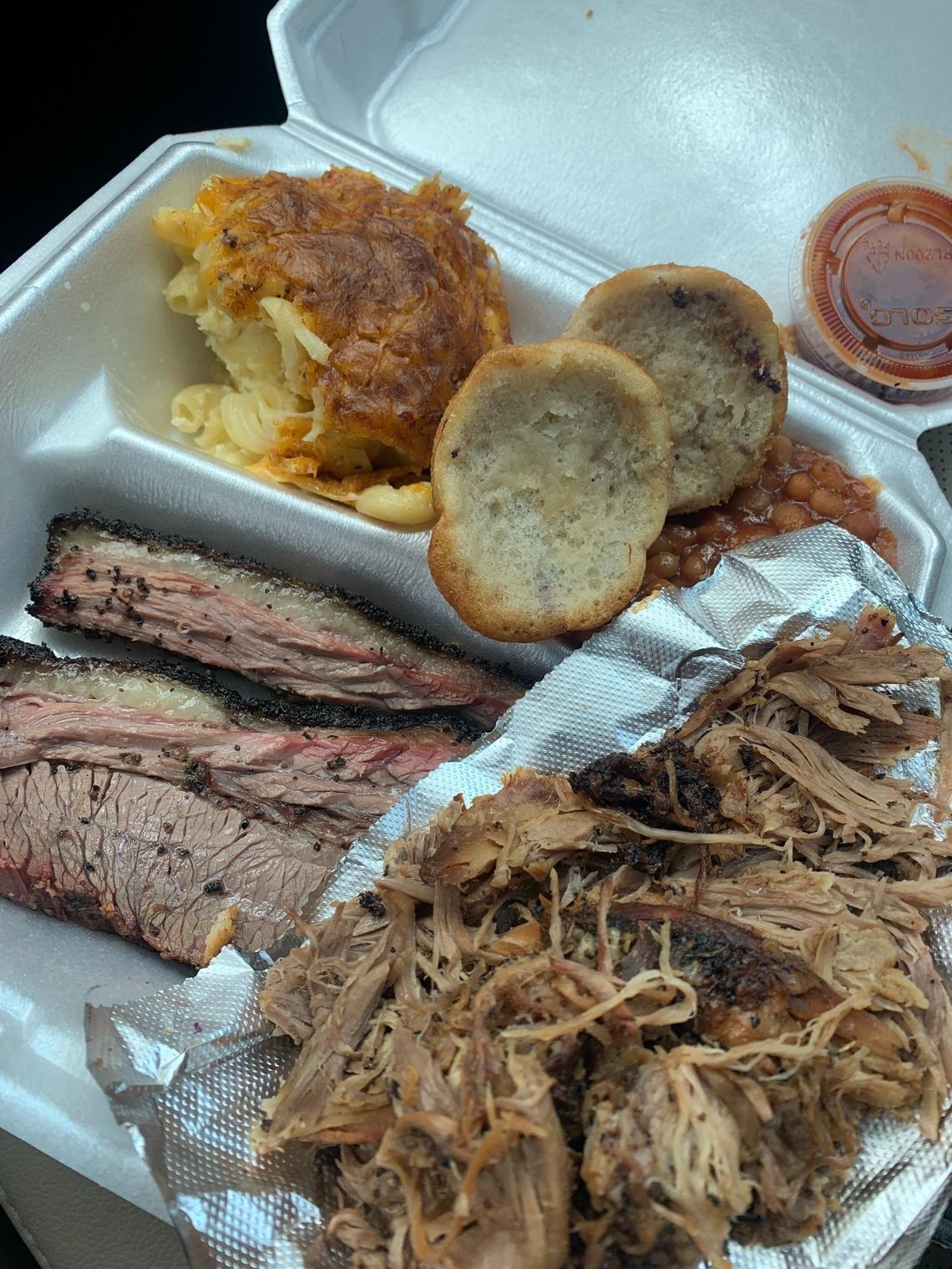 Smiths Smokehouse +Smoothies in Wake Forest veered away from North Carolina traditions, serving brisket, beef ribs, sweet mac and cheese and blueberry corn muffins. Here is a plate pictured with mac and cheese, brisket and pulled pork.