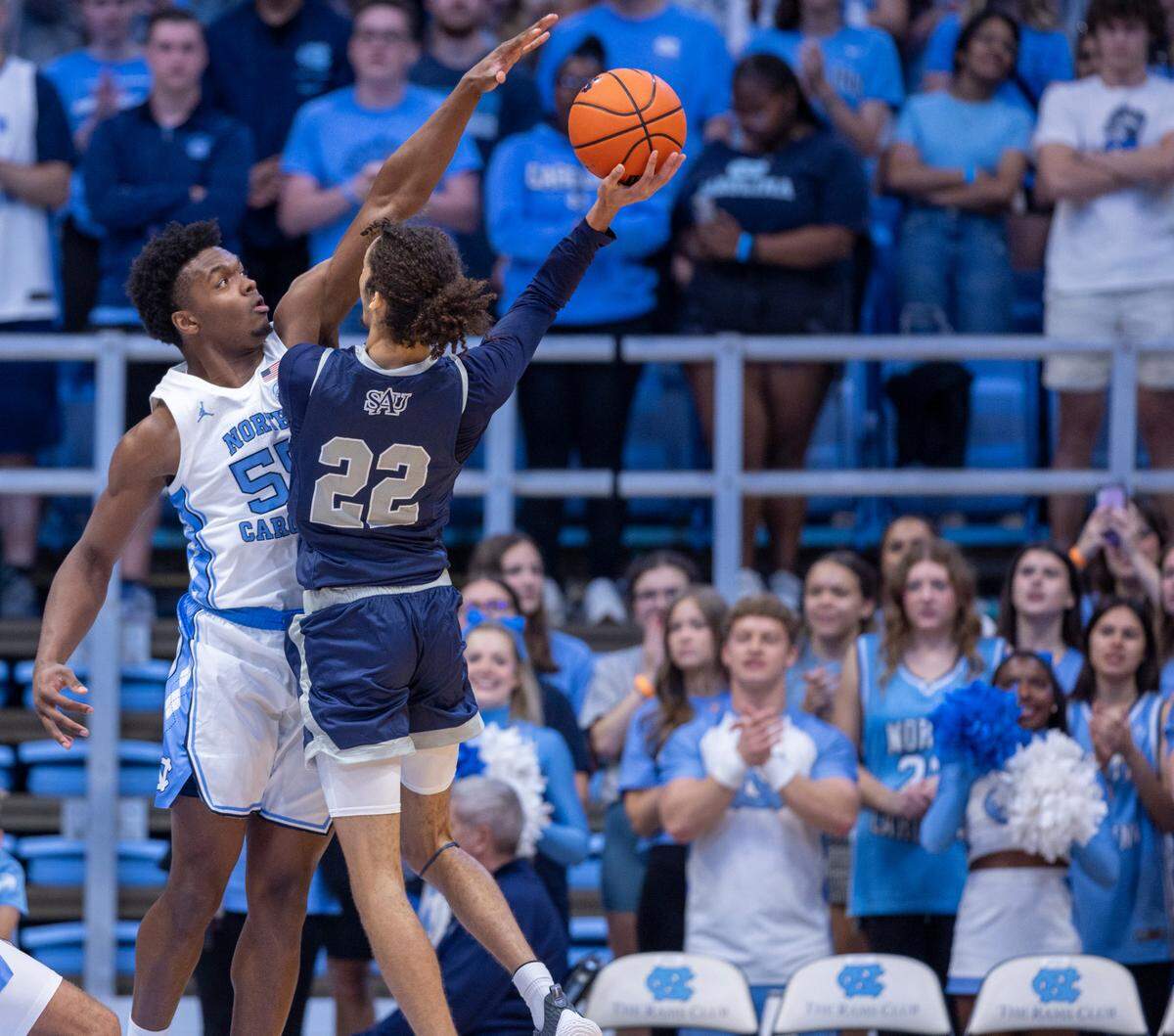 North Carolina’s Harrison Ingram (55) defends St. Augustine’s Jefferson Youngblood (22) in the first half on Friday, October 27, 2023 at the Smith Center in Chapel Hill, N.C.